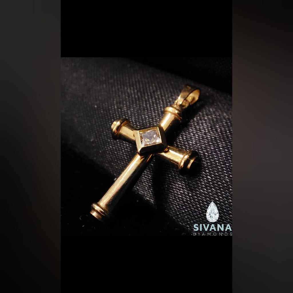 9K GOLD CROSS SET WITH A CUBIC ZIRCONIA --RP
