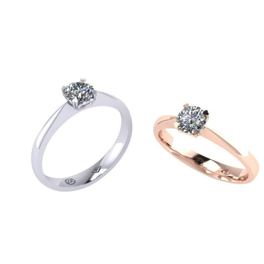 CLASSIC FOUR CLAW SOLITAIRE FEATURING A HEART MOTIF SET WITH A 0.50 CARAT ROUND BRILLIANT DIAMOND-Sivana Diamonds